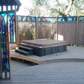 Exterior Design: Costume deck with art glass panels